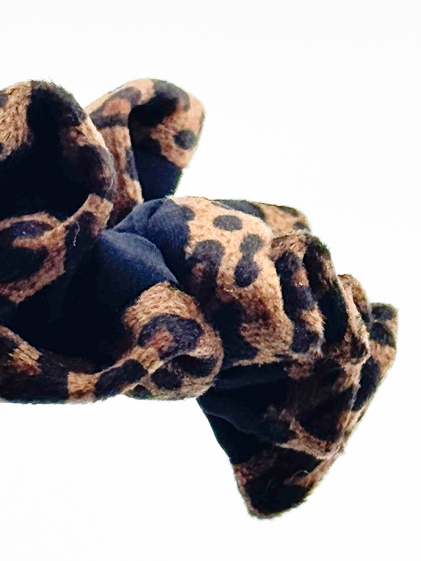 Leopard print fabric with a white background