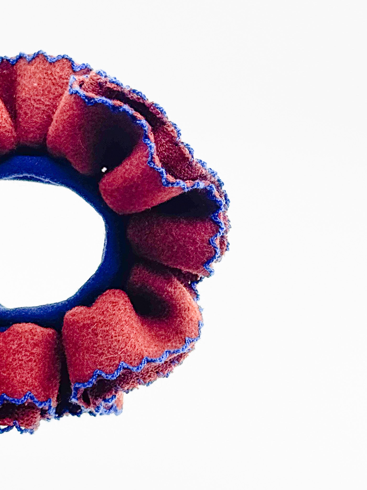 Red and blue scrunchie on a white background