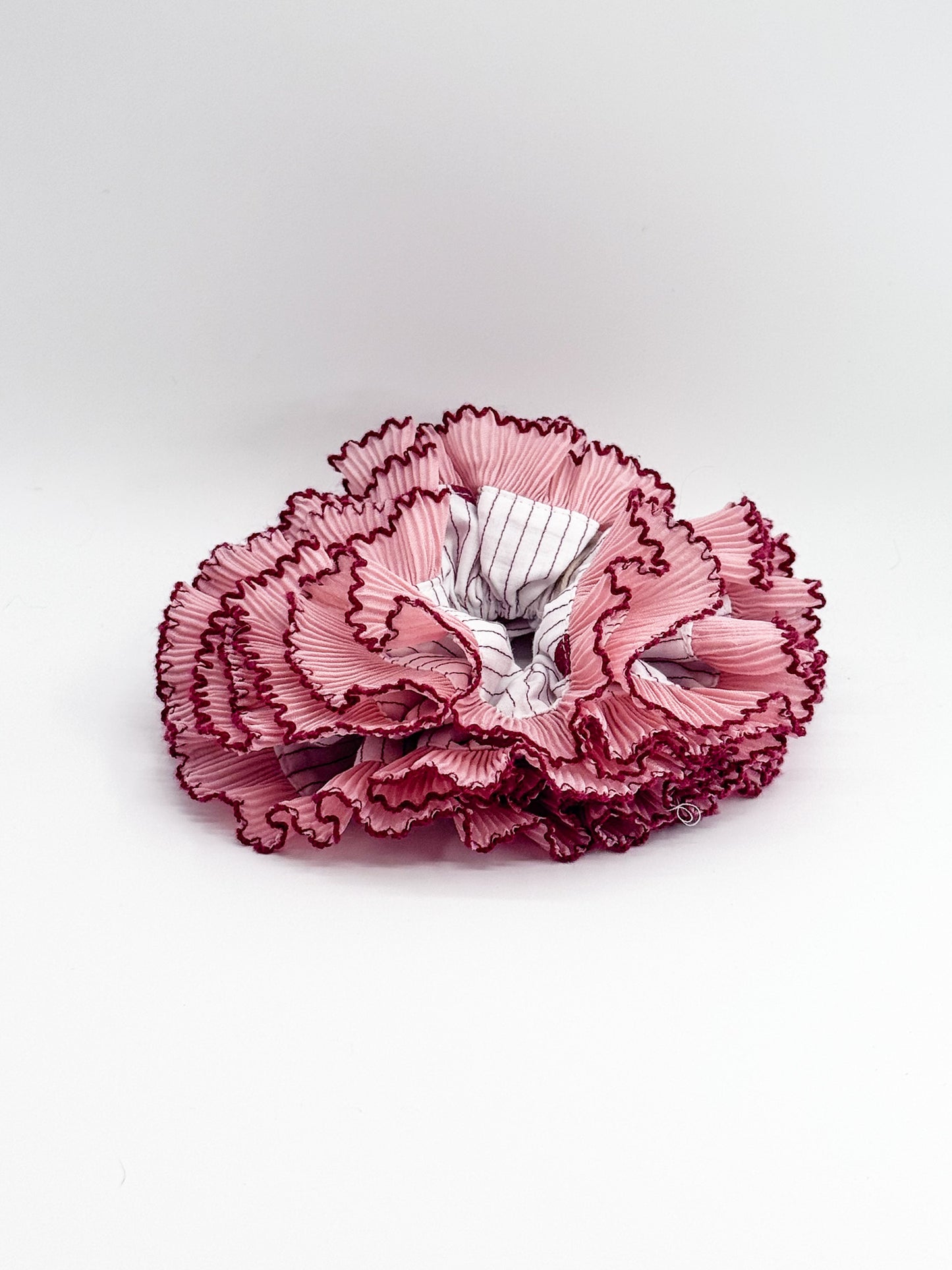 Pink floral large scrunchie on a white background