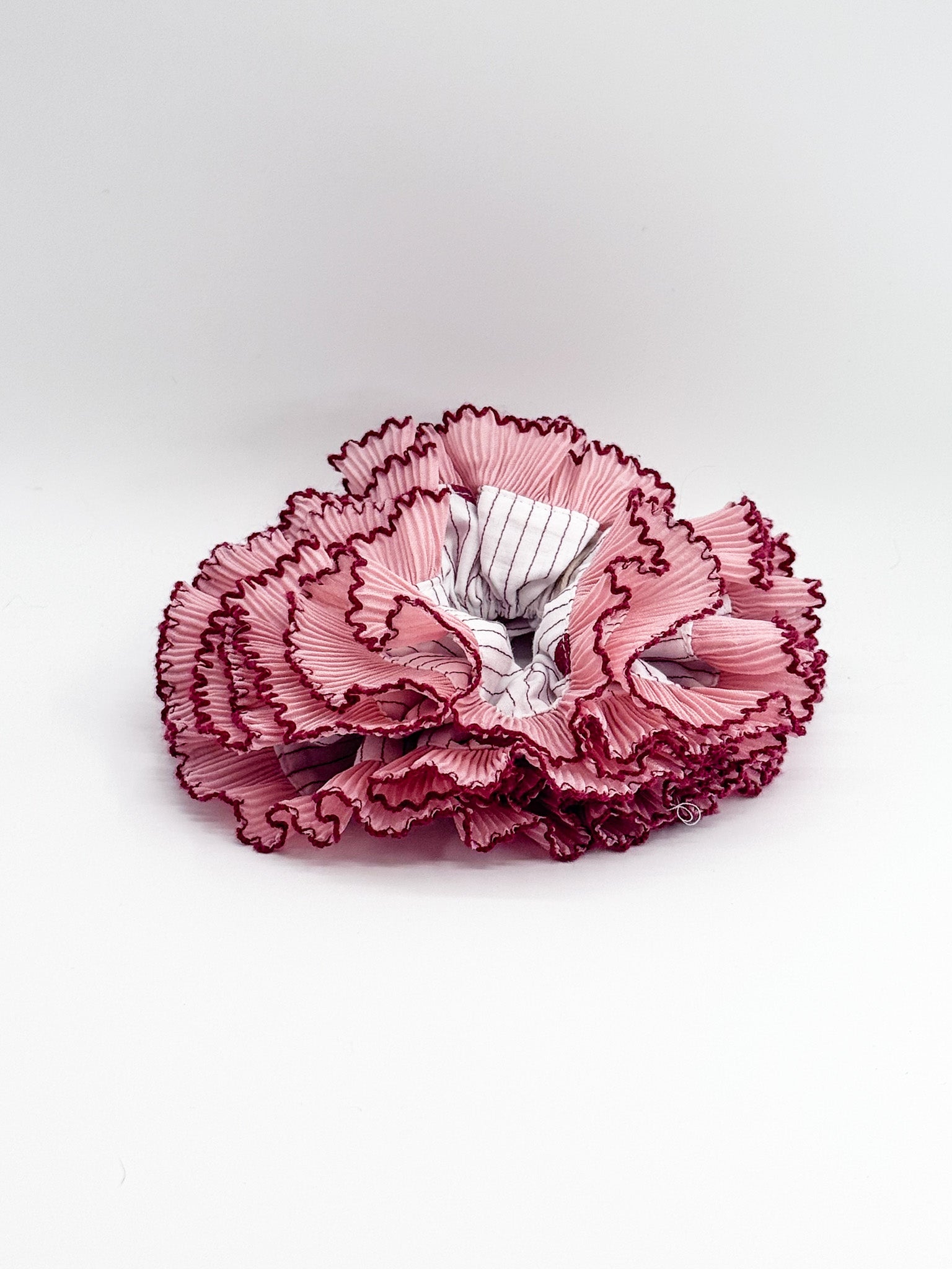 Pink floral large scrunchie on a white background